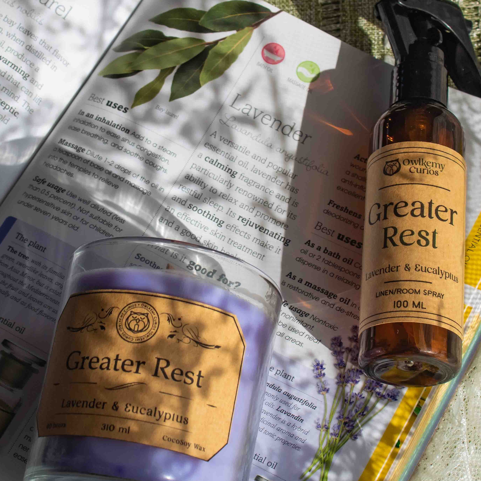 Two 'Greater Rest' products on an open book with a textured surface background