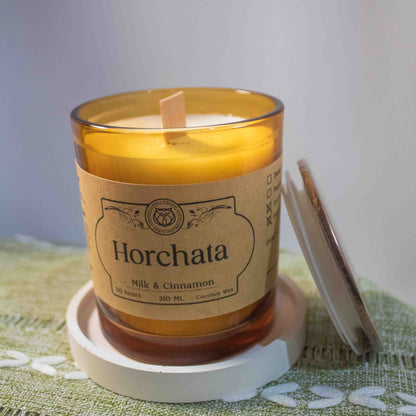 Horchata candle with a label on a textured surface